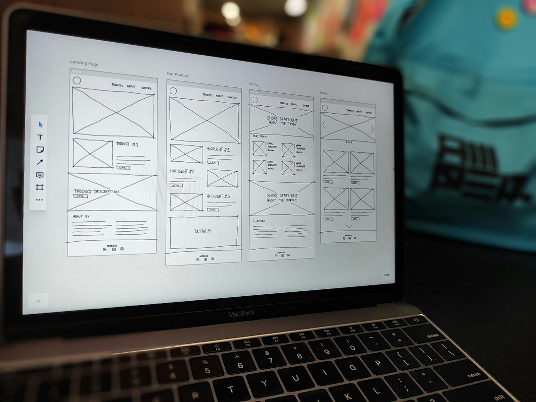Website wireframe on a laptop representing a website redesign project